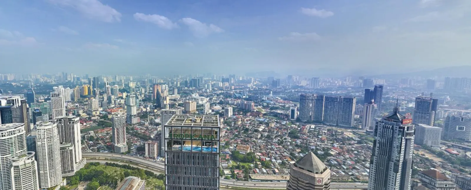 Actual view from Level 63 of the site towards the hills and Genting Highlands